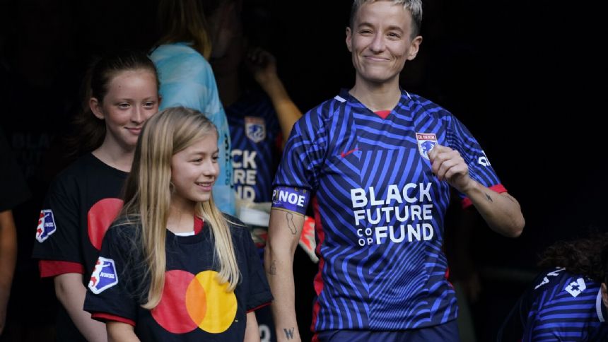 Rapinoe honored by club team OL Reign in front of record NWSL crowd