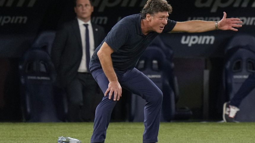 Returning Napoli coach Walter Mazzarri takes some of the credit for last season's Serie A title