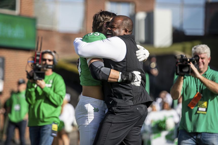 Revived UConn, hot Marshall play in Myrtle Beach Bowl