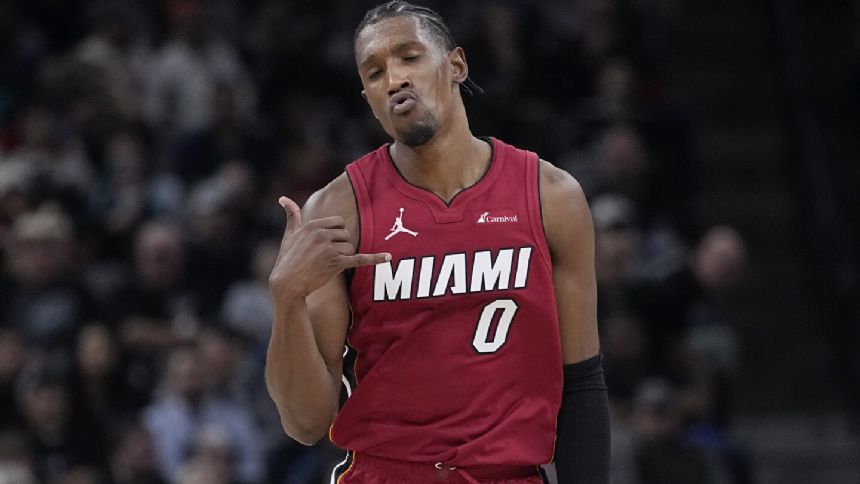 Robinson, Adebayo key rally as Heat capture fifth straight with win over Spurs, 118-113