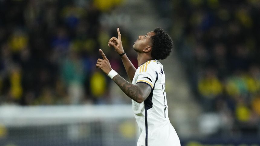 Rodrygo scores twice as Real Madrid beats Cadiz 3-0 to provisionally go top in Spain