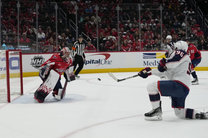 Roslovic scores 2, gets Blue Jackets past Capitals 7-6 in OT