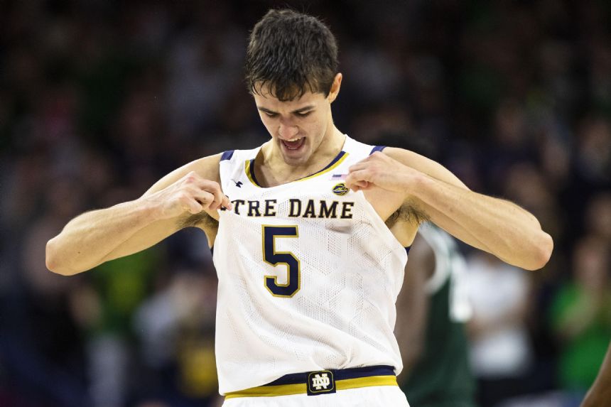 Ryan helps Notre Dame rout No. 20 Michigan State 70-52