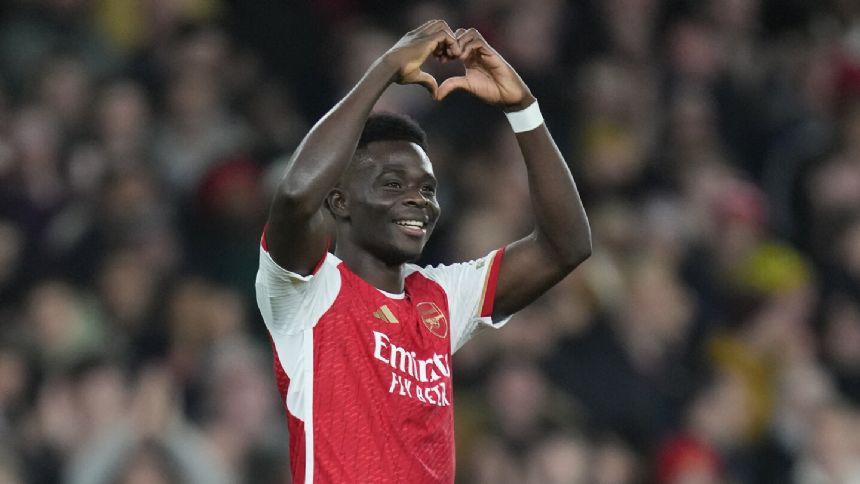 Saka stars as Arsenal beats Sevilla 2-0 in Champions League to strengthen first place in group
