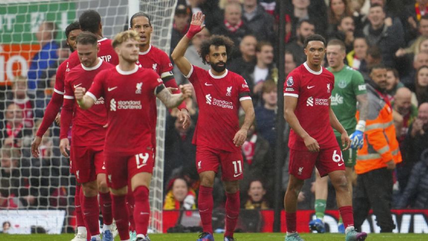 Salah scores twice as Liverpool beats 10-man Everton 2-0 in Merseyside derby in Premier League