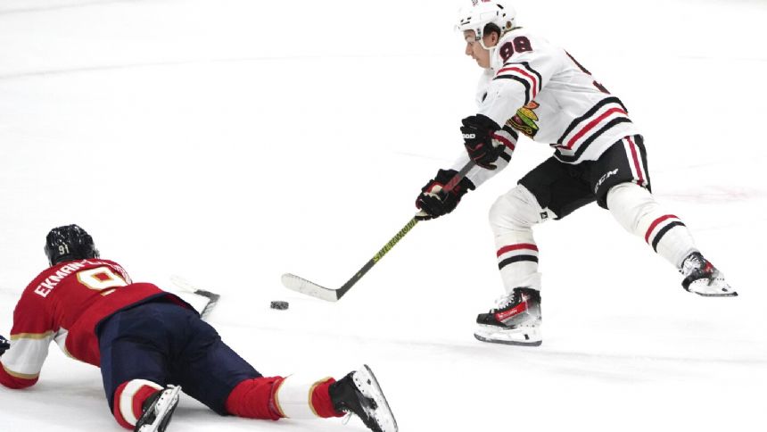 Sam Reinhart has 4-point game, Panthers overcome Connor Bedard, Blackhawks 4-3