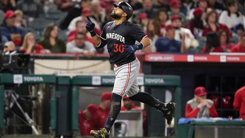 Santana homers again as Twins rout Angels 16-5