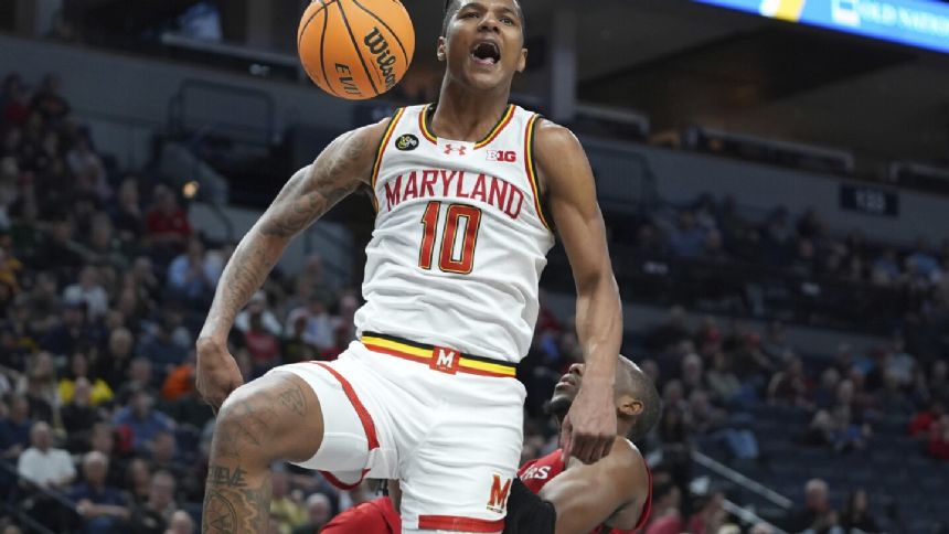 Scott scores 16, Maryland defeats Rutgers 65-51 to advance at Big Ten Tournament