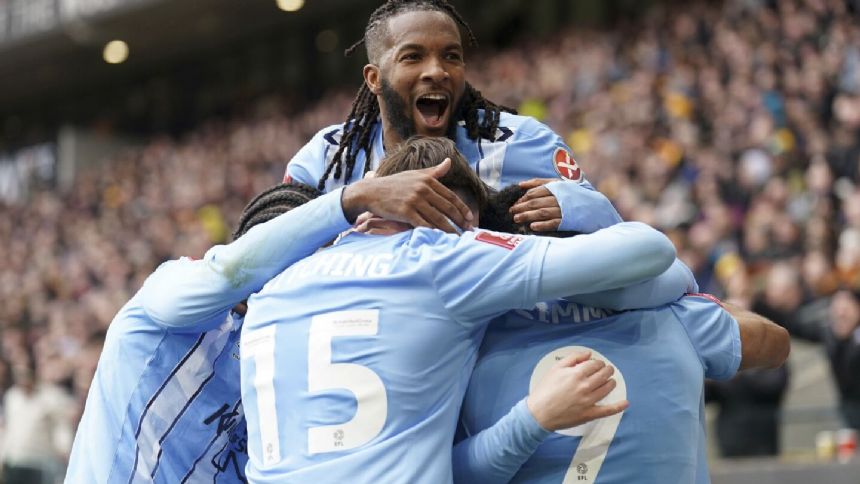 Second-tier Coventry pulls off FA Cup stunner by beating Wolves 3-2 with 2 late goals to reach semis