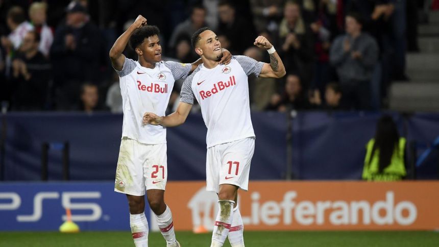 Sevilla beats Wolfsburg to stay alive in Champions League