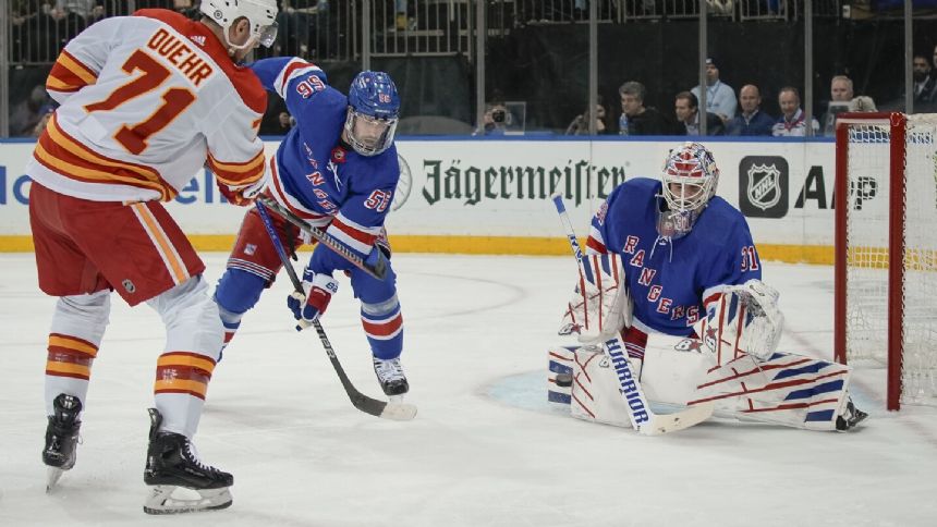 Shesterkin has 30 saves for first shutout as Rangers beat Flames 2-0 for fifth straight win