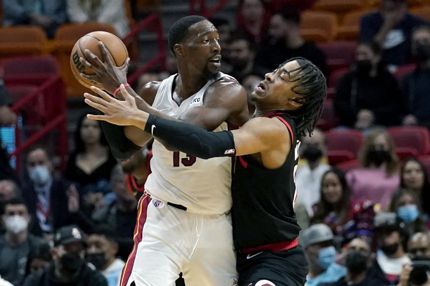 Short-handed Heat pull away late, top Trail Blazers 104-92