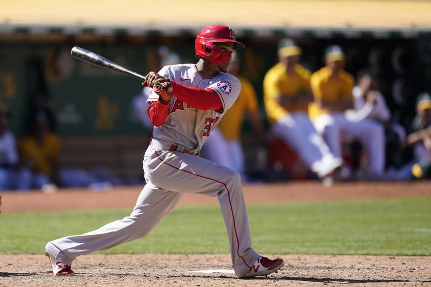 Sierra RBI double in 12th, Angels beat A's 5-4 for sweep