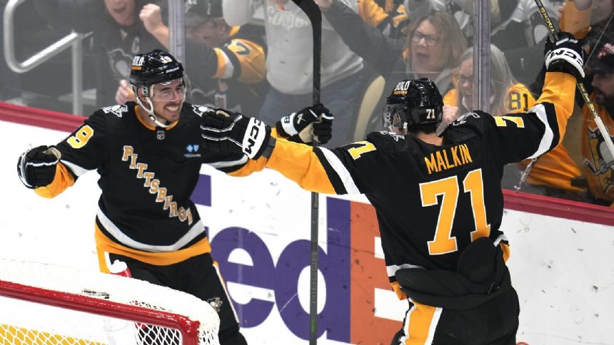 Smith scores twice, Penguins end Colorado's NHL-record road winning streak at 15 in 4-0 win