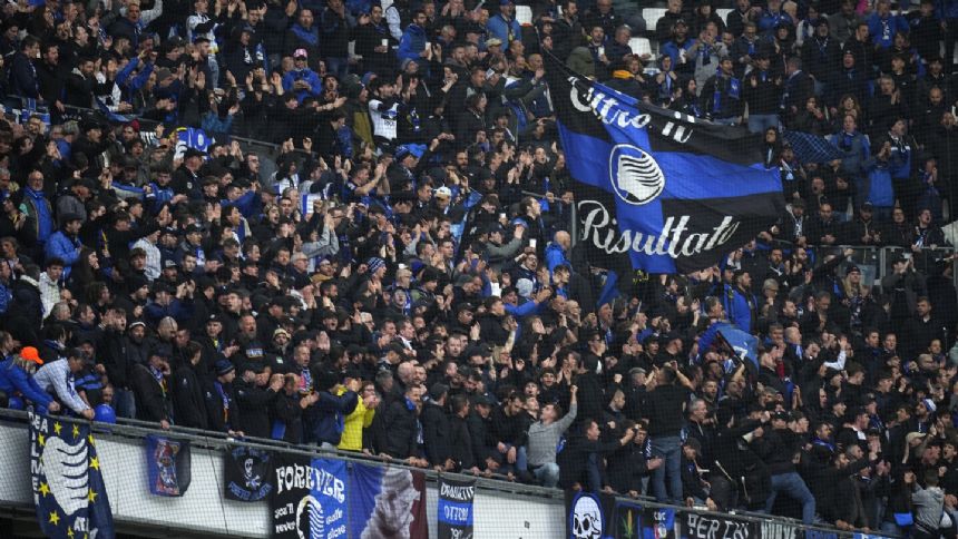 Soccer fan arrested in Marseille as authorities investigate reports of Nazi salute, monkey chants