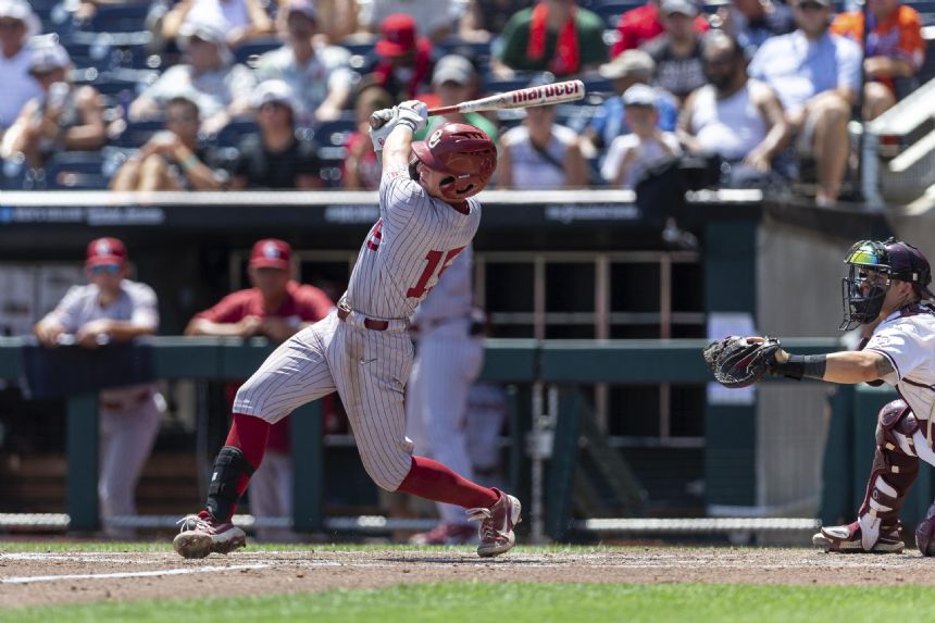 Sooners get on roll early, beat Aggies 13-8 in CWS opener