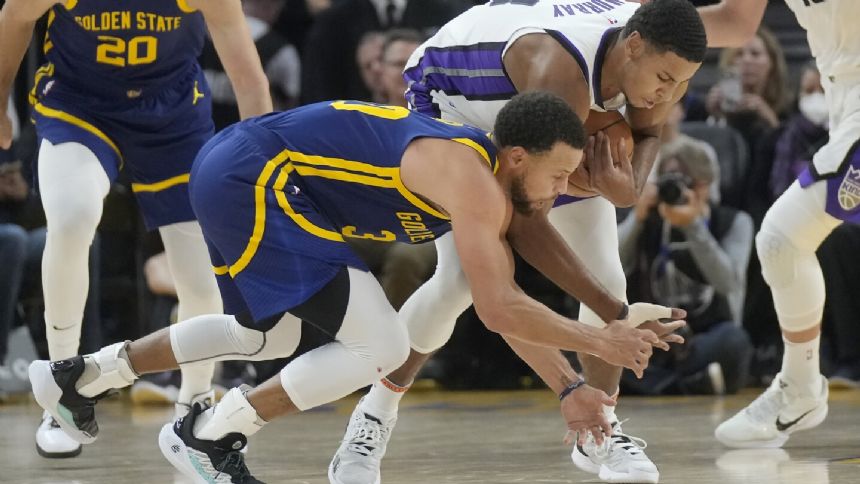 Splash Brothers Curry, Thompson send Warriors past Kings, 102-101