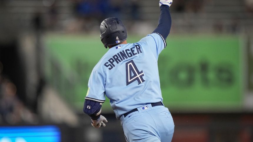 Springer hits a leadoff homer on his birthday, Blue Jays beat the Yankees 7-1