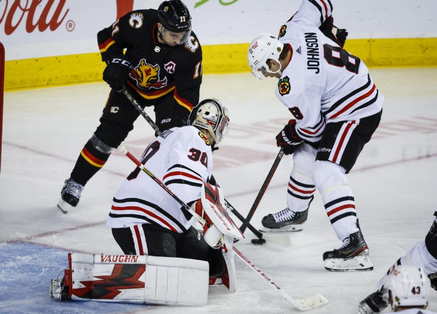 Stauber wins again, Blackhawks beat Flames 5-1