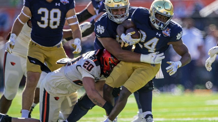 Steve Angeli throws for 3 TDs, No. 15 Notre Dame beats No. 21 Oregon State 40-8 in Sun Bowl