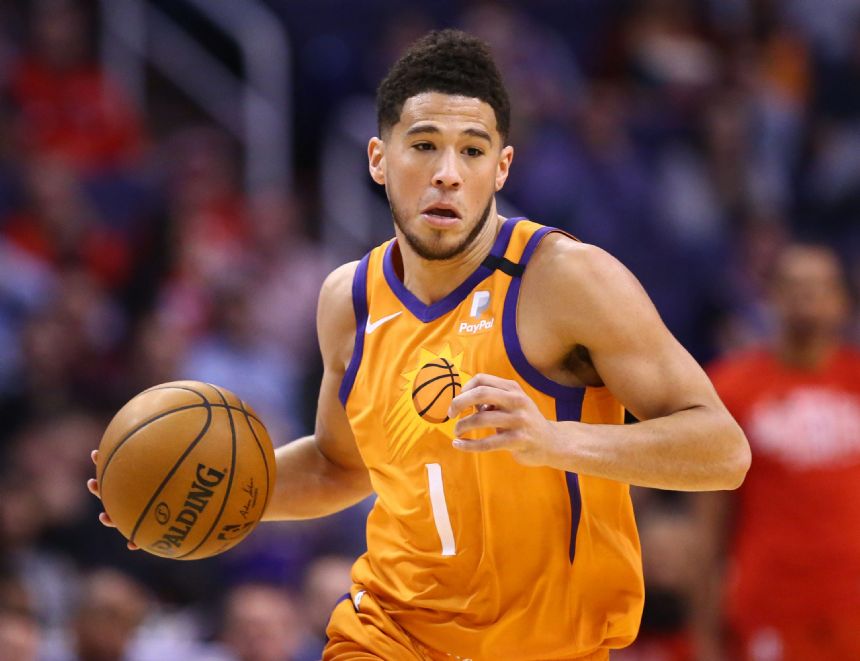 Suns' Devin Booker leaves game with hamstring injury