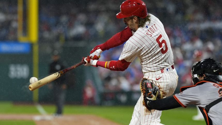 Suarez has strong 6-inning outing as the streaking Phillies rout the Giants 14-3