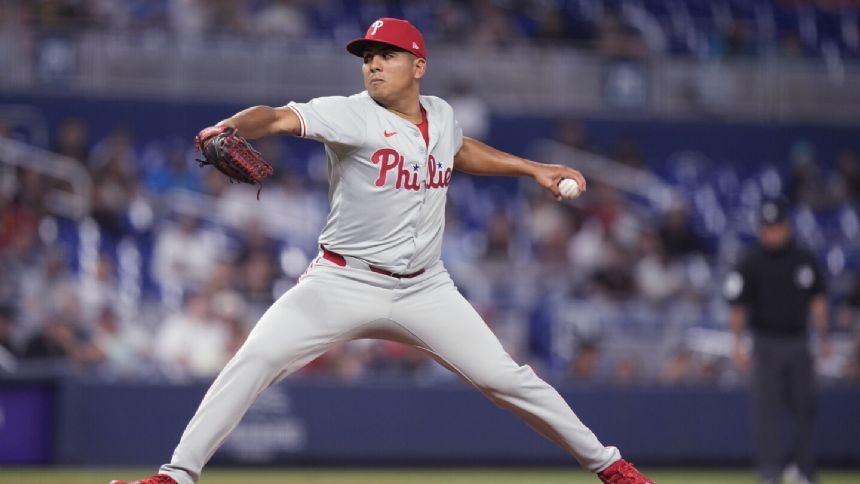Suarez throws 7 scoreless innings, Castellanos and Rojas homer in Phillies 8-2 win over Marlins