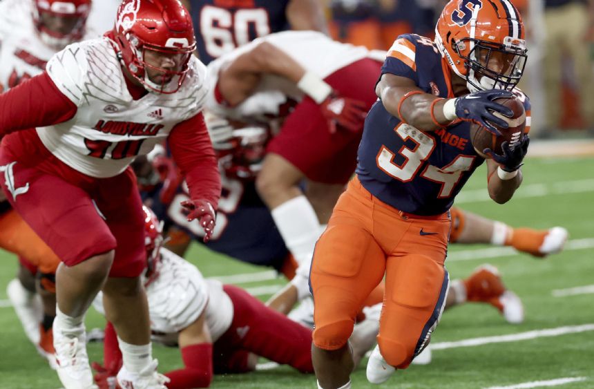Syracuse's new-look offense vanquishes Louisville, 31-7