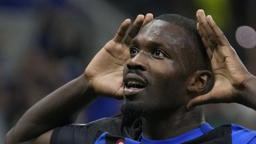 Thuram scores to help Inter beat Benfica 1-0 and go joint top of Champions League group