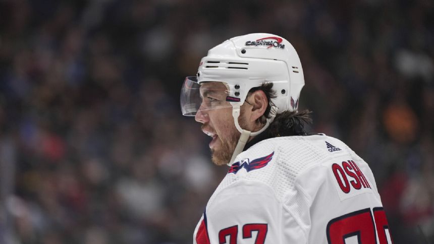 T.J. Oshie returns to the Capitals' lineup and is honored for playing in 1,000 NHL games