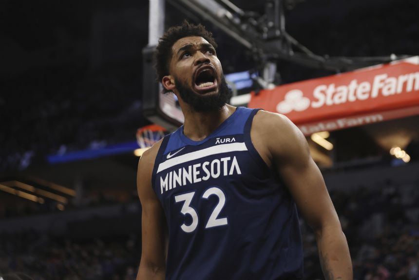 Towns carries Timberwolves past Curry-less Warriors, 119-99