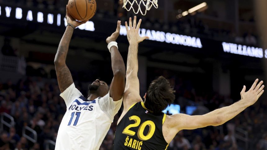 Towns scores 33, sends Timberwolves past Warriors after early ejections in tourney game