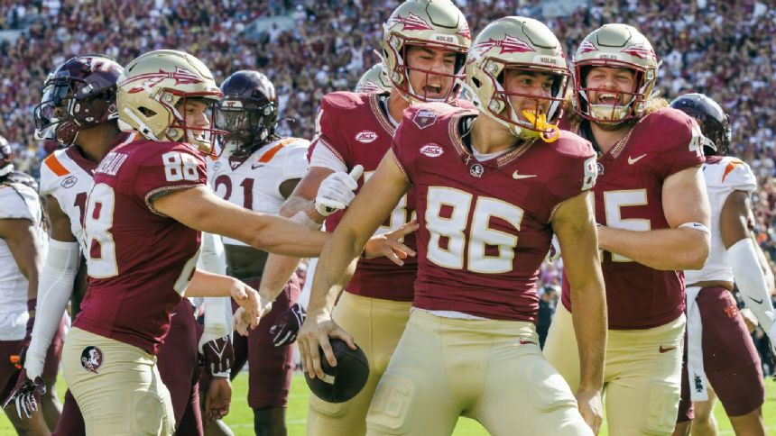 Trey Benson runs for 200 yards, 2 TDs to help No. 5 Florida State beat Virginia Tech 39-17