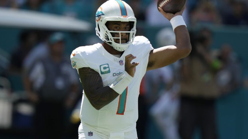 Tua Tagovailoa throws 3 TD passes to rally the Dolphins past the Panthers 42-21