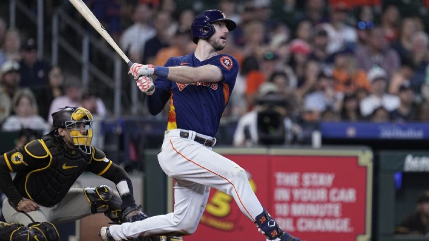 Tucker hits 2 RBI triples in an inning, Astros rout Padres 12-2