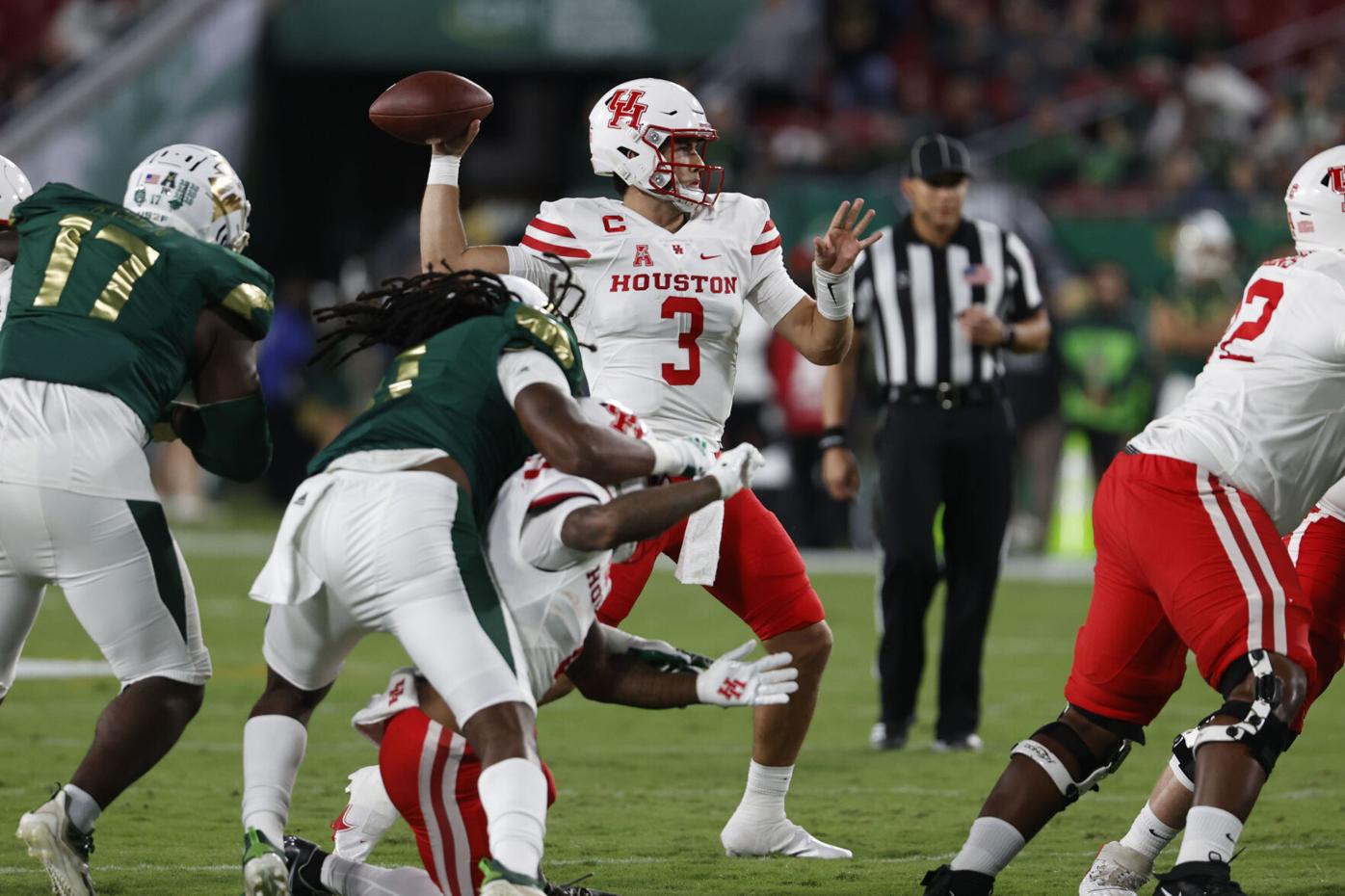Tune passes for 385 yards, No. 20 Houston tops USF 54-42