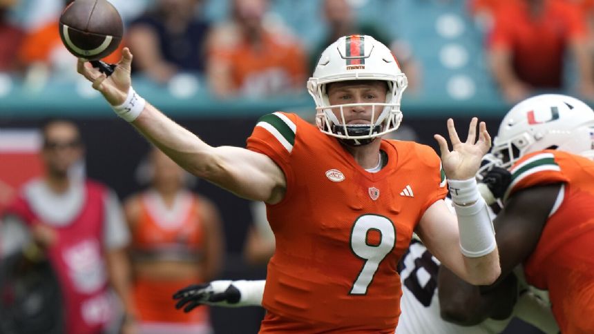 Tyler Van Dykes throws 5 TD passes in Miami's statement 48-33 win over No. 23 Texas A&M