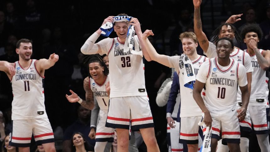 UConn continues title defense handles Northwestern 75-58