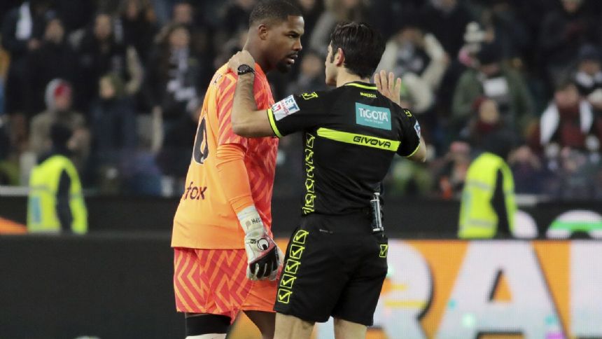 Udinese says fans who racially abused Milan goalkeeper Maignan will be banned for life