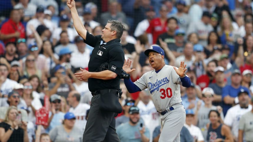 Umpire Baker leaves Blue Jays-Red Sox game after being struck by multiple foul tips