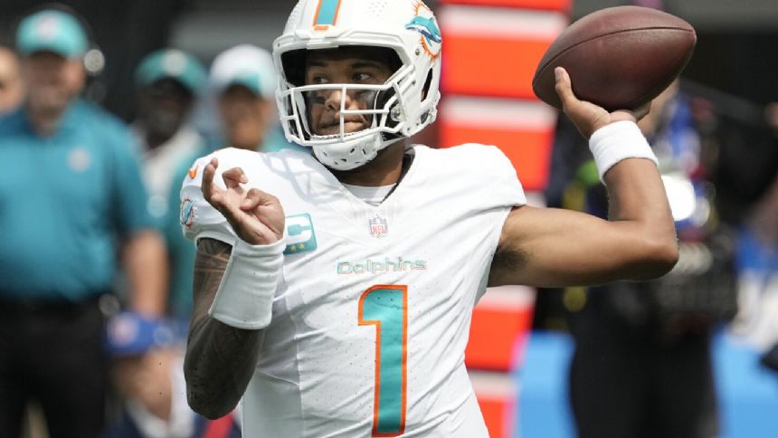 Unbeaten in 4 starts vs. Patriots, Dolphins' Tagovailoa brings NFL's top offense into latest matchup