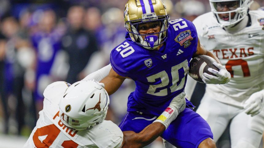 University of Washington football player arrested, charged with raping 2 women