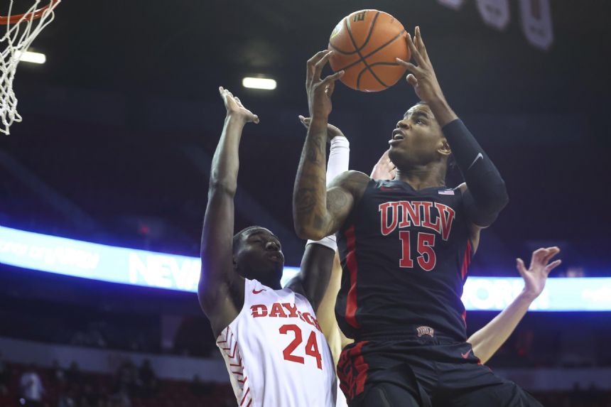 UNLV rallies from 12 down to defeat No. 21 Dayton 60-52