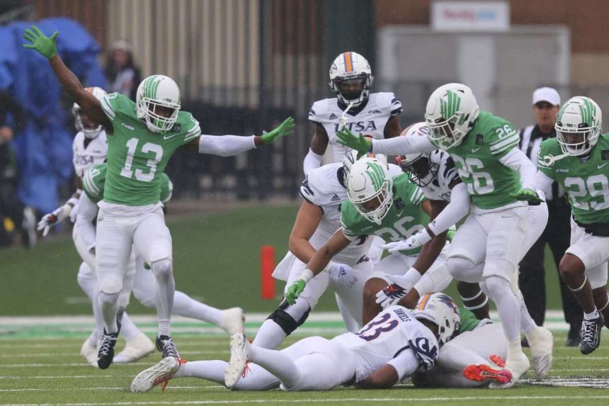Upsets by North Texas, others push bowl-eligible teams to 83