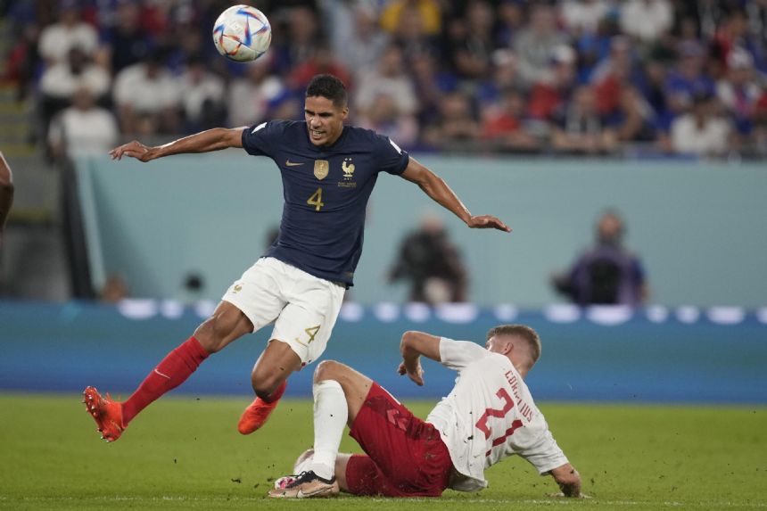 Varane's return lifts French mood even higher at World Cup