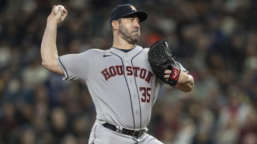 Verlander takes shutout into 9th as Astros top skidding Mariners 5-1 in key AL West matchup