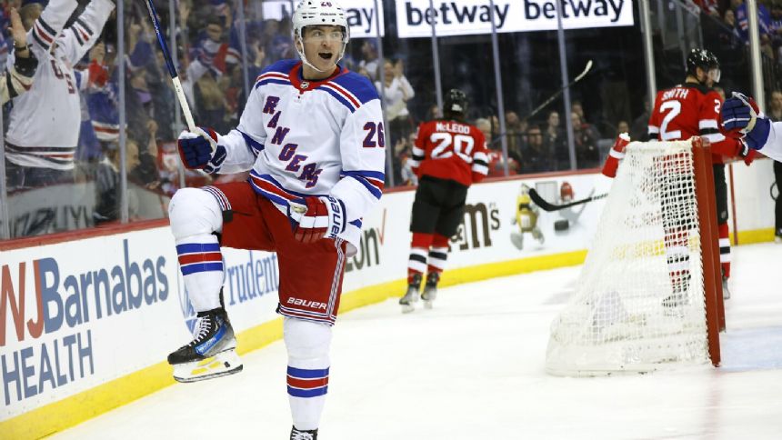 Vesey and Panarin each score twice as streaking Rangers beat rival Devils 5-3