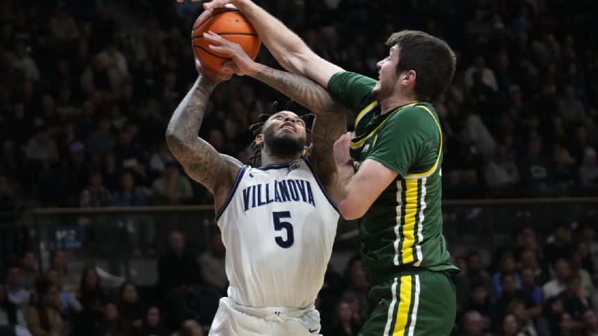 Villanova pulls away late in 1st half to down Le Moyne 83-57