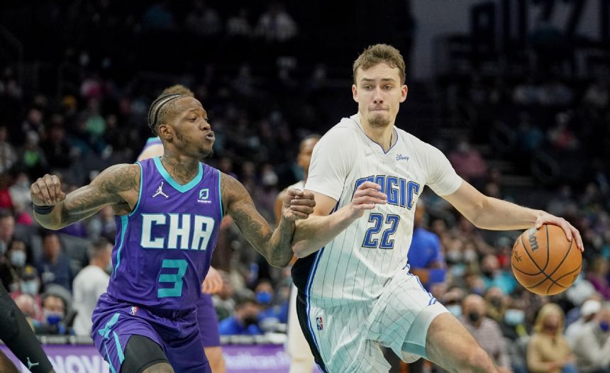 Wagner brothers, Magic top Hornets to end 10-game skid