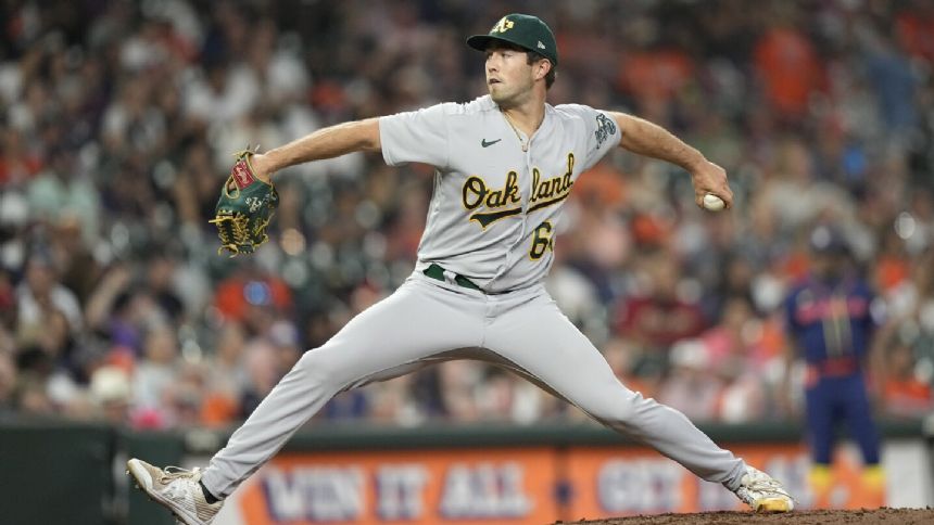 Waldichuk holds Astros hitless in relief, A's launch 3 homers in 4-0 win to avoid 100th loss